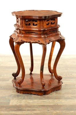 Lot 128 - A CHINESE FIGURED HARDWOOD STAND