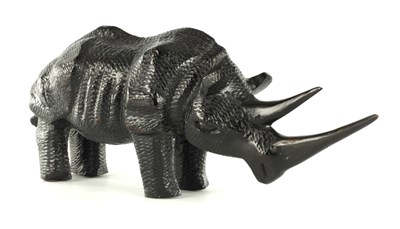 Lot AN AFRICAN CARVED EBONY SCULPTURE