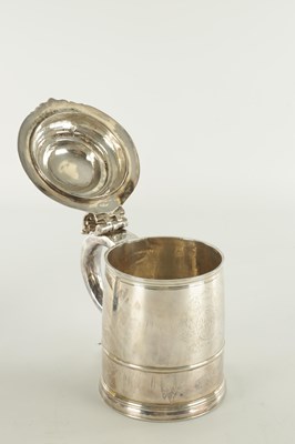 Lot 366 - A WILLIAM AND MARY SILVER LIDDED TANKARD