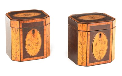 Lot A PAIR OF GEORGIAN MAHOGANY AND SATINWOOD PENWORK TEA CADDIES