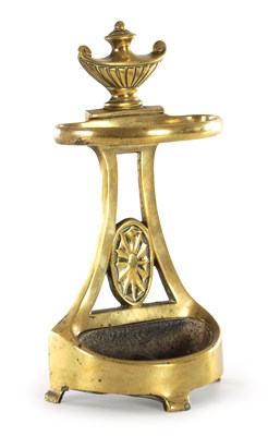 Lot A 19TH CENTURY CAST BRASS DOOR STOP FORMED AS A STICK STAND