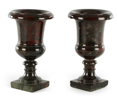 Lot A PAIR OF 19TH CENTURY SERPENTINE MARBLE URNS