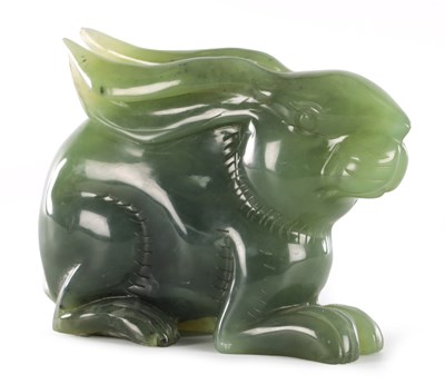 Lot A CHINESE CARVED JADE SCULPTURE OF A RABBIT