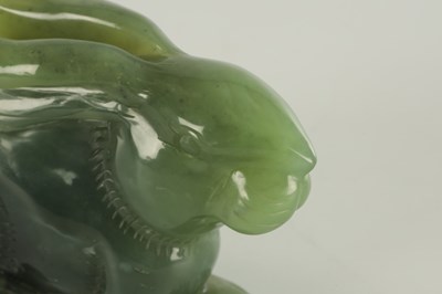 Lot 188 - A CHINESE CARVED JADE SCULPTURE OF A RABBIT