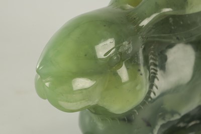 Lot 188 - A CHINESE CARVED JADE SCULPTURE OF A RABBIT