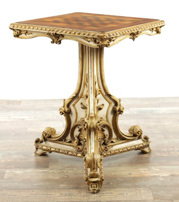 Lot A GOOD REGENCY PAINTED CARVED WOOD AND PARQUETRY INLAID GAMES TABLE IN THE MANNER OF HENRY HOLLAND