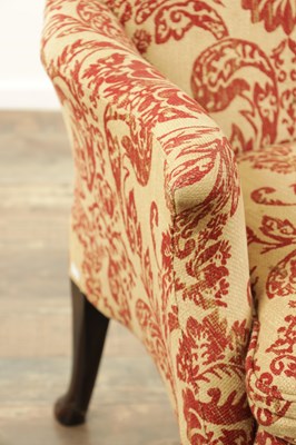 Lot 1315 - A GEORGE II STYLE TWO SEATER CARVED MAHOGANY SETTEE