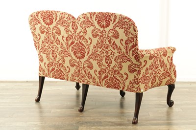 Lot 1315 - A GEORGE II STYLE TWO SEATER CARVED MAHOGANY SETTEE