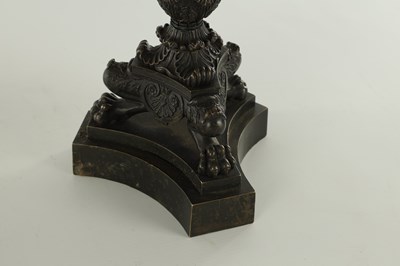 Lot 520 - A PAIR OF REGENCY BRONZE THREE BRANCH CANDELABRA