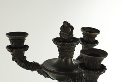 Lot 520 - A PAIR OF REGENCY BRONZE THREE BRANCH CANDELABRA