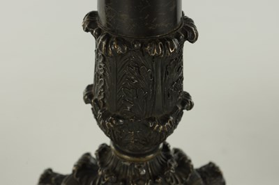 Lot 520 - A PAIR OF REGENCY BRONZE THREE BRANCH CANDELABRA