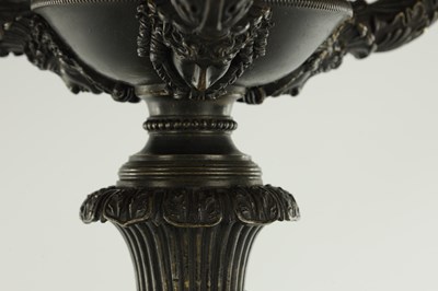 Lot 520 - A PAIR OF REGENCY BRONZE THREE BRANCH CANDELABRA