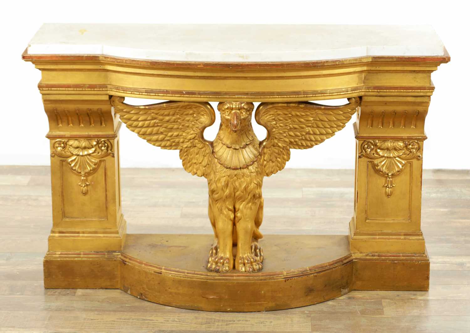 Lot 1308 - AN UNUSUAL REGENCY GILTWOOD CONSOLE TABLE