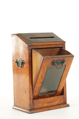 Lot 734 - A LATE 19TH CENTURY OAK LETTER BOX