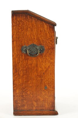 Lot 734 - A LATE 19TH CENTURY OAK LETTER BOX