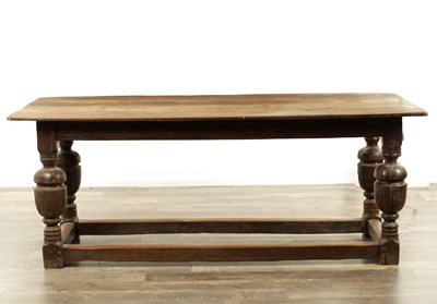Lot 1199 - AN EARLY 18TH CENTURY OAK REFECTORY TABLE