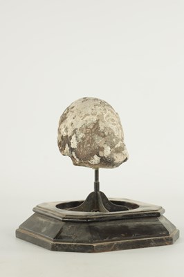 Lot 341 - AN EARLY CARVED STONE HEAD UNDER GLASS DOME