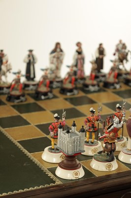 Lot 36 - TOWER OF LONDON 900TH ANNIVERSARY CHESS SET AND OAK GAMES TABLE