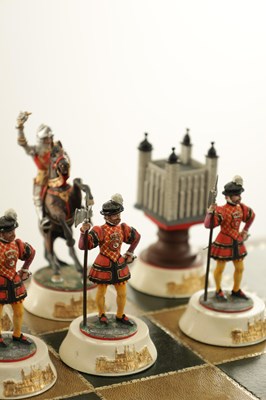 Lot 36 - TOWER OF LONDON 900TH ANNIVERSARY CHESS SET AND OAK GAMES TABLE