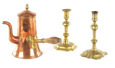 Lot A GEORGE III SEAMED COPPER COFFEE POT TOGETHER WITH TWO 18TH CENTURY CAST BRASS CANDLESTICKS