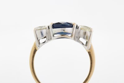 Lot 248 - A 20TH CENTURY 18CT GOLD SAPPHIRE AND DIAMOND THREE-STONE RING