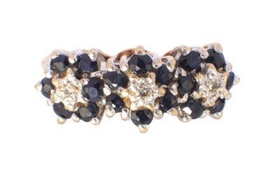 Lot 202 - A 9CT GOLD SAPPHIRE AND DIAMOND CLUSTER RING