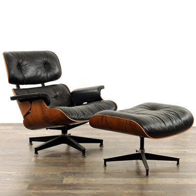 Lot CHARLES AND RAY EAMES. A 1970's LEATHER UPHOLSTERED LOUNGE CHAIR AND OTTOMAN