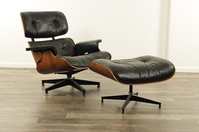Lot 1269 - CHARLES AND RAY EAMES. A 1970's LEATHER UPHOLSTERED LOUNGE CHAIR AND OTTOMAN