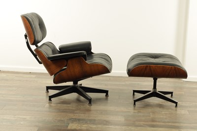 Lot 1269 - CHARLES AND RAY EAMES. A 1970's LEATHER UPHOLSTERED LOUNGE CHAIR AND OTTOMAN