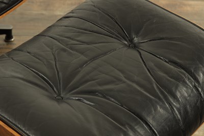 Lot 1269 - CHARLES AND RAY EAMES. A 1970's LEATHER UPHOLSTERED LOUNGE CHAIR AND OTTOMAN