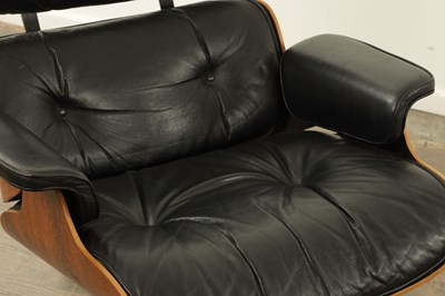 Lot 1269 - CHARLES AND RAY EAMES. A 1970's LEATHER UPHOLSTERED LOUNGE CHAIR AND OTTOMAN