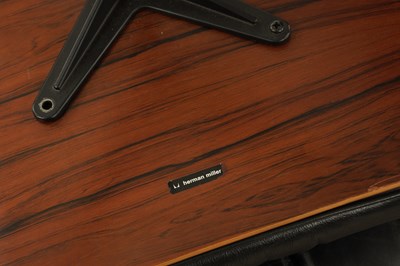 Lot 1269 - CHARLES AND RAY EAMES. A 1970's LEATHER UPHOLSTERED LOUNGE CHAIR AND OTTOMAN