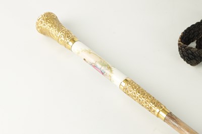 Lot 797 - A 9CT GOLD HANDLED PARASOL AND AN 18CT GOLD PLATED AND CERAMIC PARASOL