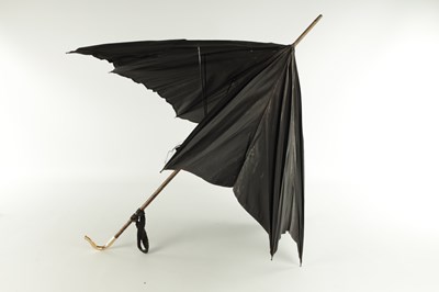 Lot 797 - A 9CT GOLD HANDLED PARASOL AND AN 18CT GOLD PLATED AND CERAMIC PARASOL