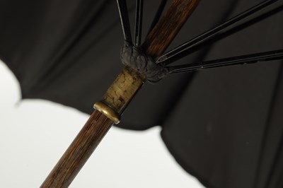 Lot 797 - A 9CT GOLD HANDLED PARASOL AND AN 18CT GOLD PLATED AND CERAMIC PARASOL