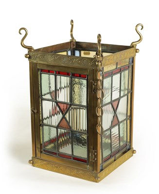 Lot 660 - A LATE 19TH CENTURY BRASS AND STAINED GLASS HALL LANTERN