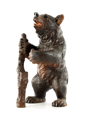 Lot A LATE 19TH CENTURY BLACK FOREST CARVED BEAR TOBACCO JAR