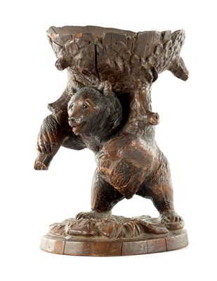 Lot 742 - A LATE 19TH CENTURY BLACK FOREST CARVED BEAR CENTREPIECE