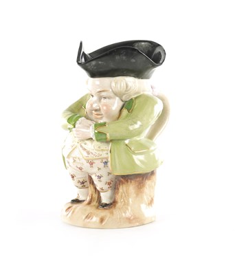 Lot AN EARLY 19TH CENTURY STAFFORDSHIRE TOBY JUG