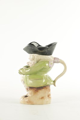 Lot 41 - AN EARLY 19TH CENTURY STAFFORDSHIRE TOBY JUG