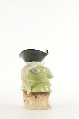 Lot 41 - AN EARLY 19TH CENTURY STAFFORDSHIRE TOBY JUG
