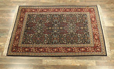 Lot AN EARLY 20TH CENTURY TURKISH WOOL CARPET