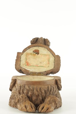 Lot 752 - A LARGE 19TH CENTURY BLACK FOREST CARVED LINDEN WOOD MUSICAL DOGS HEAD TABACCO BOX