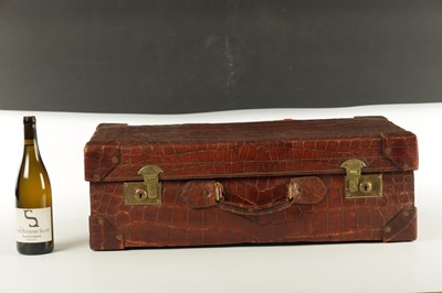 Lot 658 - A CROCODILE SKIN SUITCASE CIRCA 1900