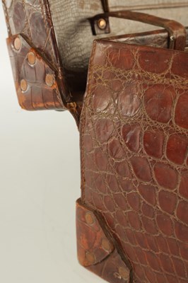 Lot 658 - A CROCODILE SKIN SUITCASE CIRCA 1900