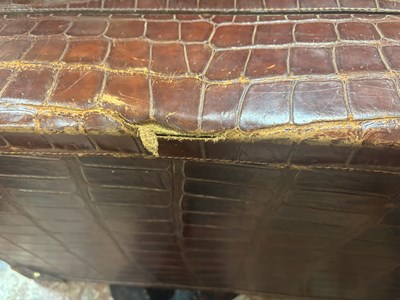 Lot 658 - A CROCODILE SKIN SUITCASE CIRCA 1900