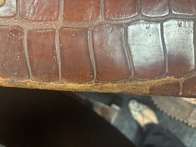 Lot 658 - A CROCODILE SKIN SUITCASE CIRCA 1900