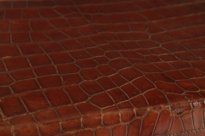 Lot 658 - A CROCODILE SKIN SUITCASE CIRCA 1900