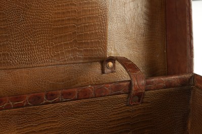 Lot 658 - A CROCODILE SKIN SUITCASE CIRCA 1900