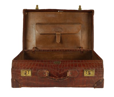 Lot 658 - A CROCODILE SKIN SUITCASE CIRCA 1900